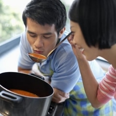 Young Couple Tasting the Soup