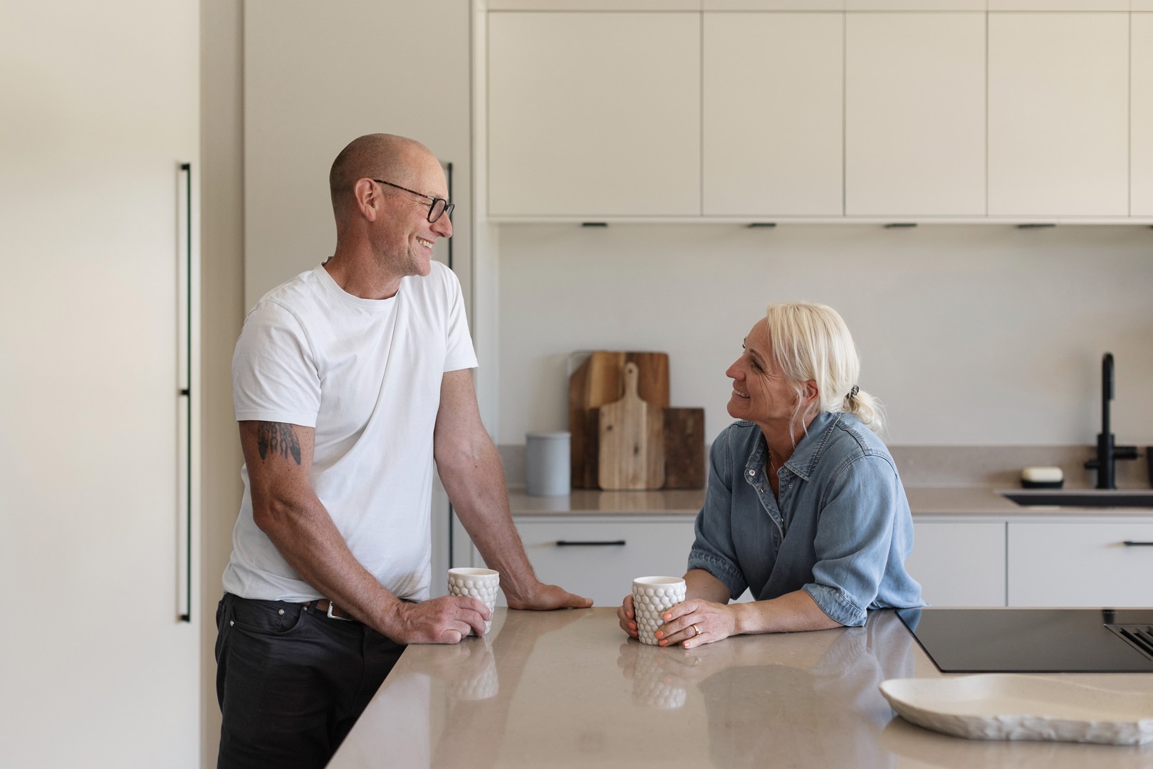 Homeowners Martin and Kicki at their kitchen island